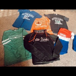 Bundle of Outer Banks shirts and jacket